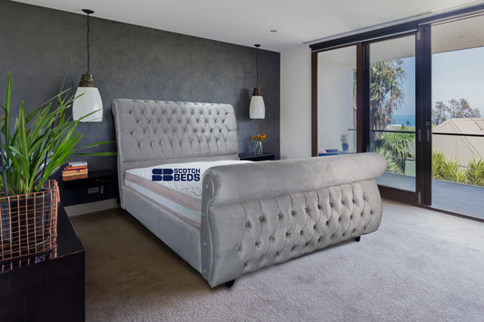 Spacious interior of designer master bedroom in luxury Australia